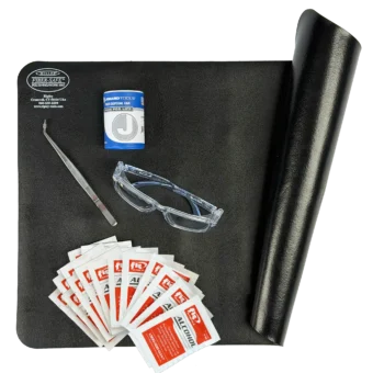 Fiber Optic Safety Kit featuring a fiber mat, safety glasses, tweezers trash can and alcohol wipes